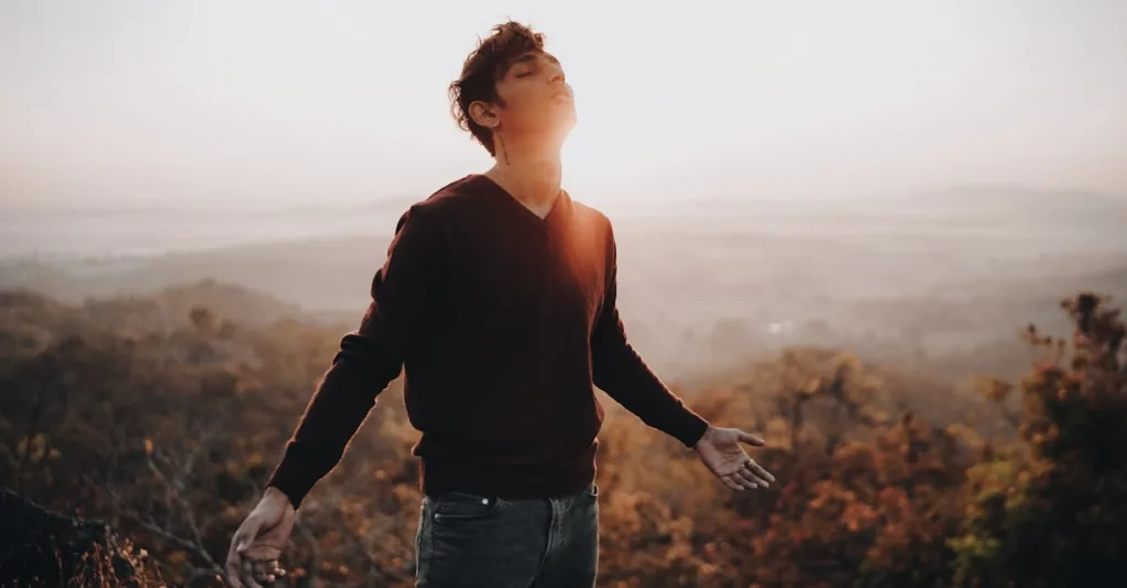 A young man in nature reflecting on if he is too sensitive for his family