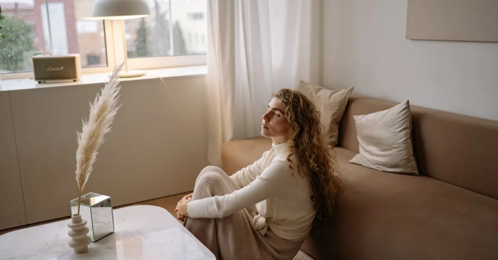 Woman sitting thinking about why am i so angry